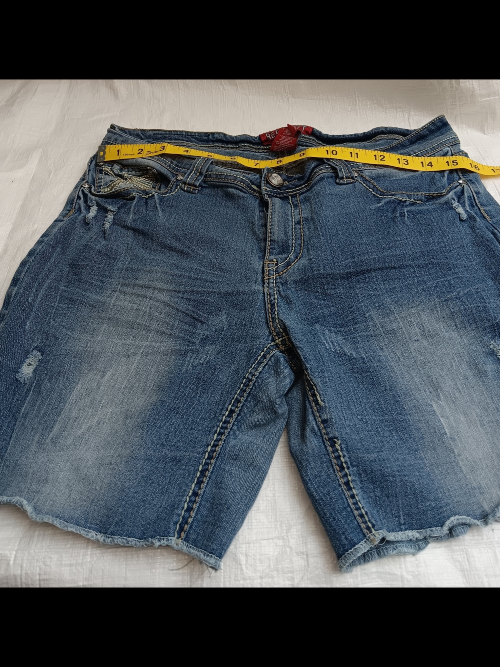 Red Rivet Red-Accented Denim Label Detail